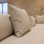 Aria L-Shaped Five-Seater Modular Sofa in beige bouclé by Marina Living UAE