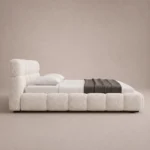 Bubble Cloud Bed in beige linen with rounded upholstered sections by Marina Living UAE