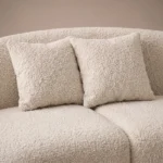 Casa Curved Sofa in beige bouclé by Marina Living UAE