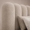 Cocoon-Petal-Cylinder-Bed Cocoon Petal Cylinder Bed in beige linen with rounded cylinder upholstery by Marina Living UAE